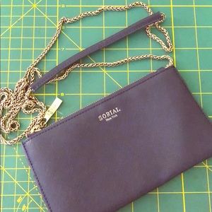 Sorial crossbody clutch